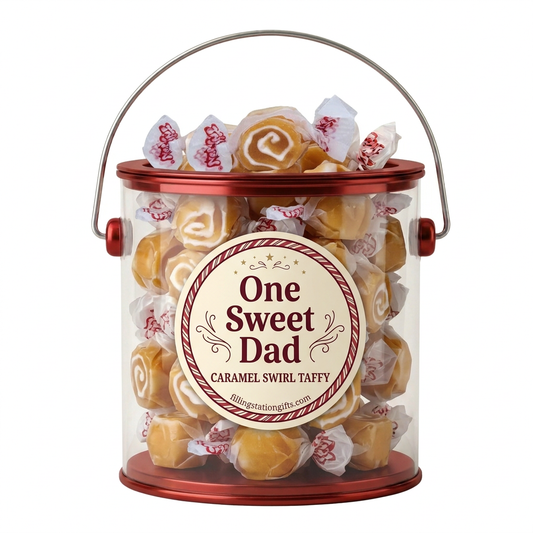 Red One Sweet Dad gift bucket filled with Caramel Swirl taffy on a white background